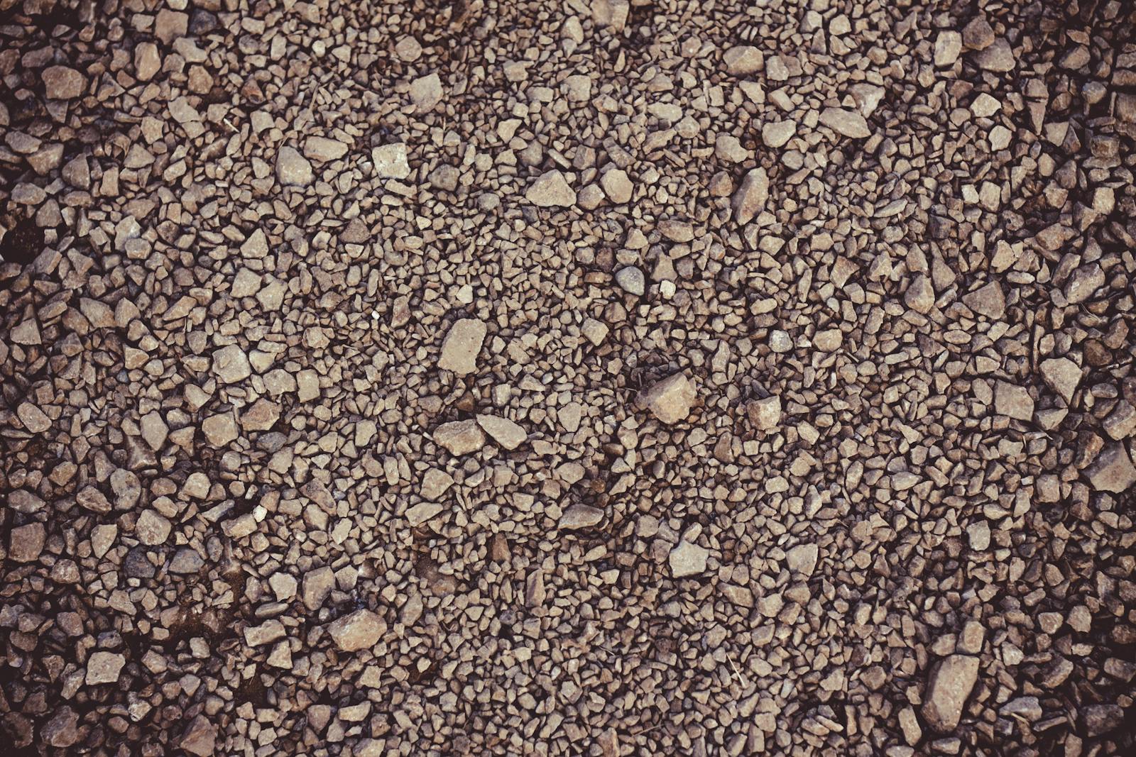 Crushed-stone aggregate close-up — driveway base material