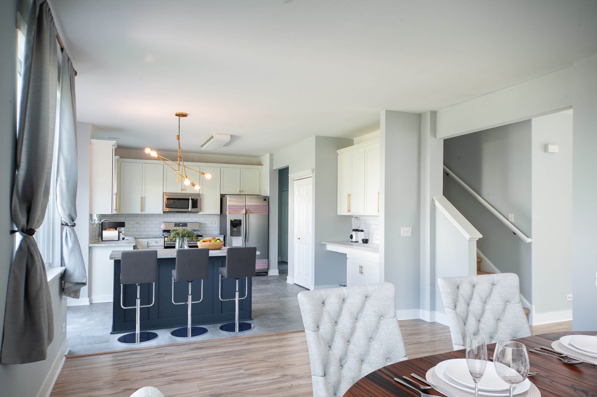 Wide kitchen and dining area at a suburban Chicago gut rehab